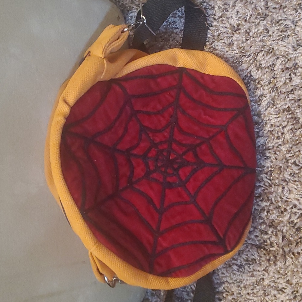 Spiderweb pumpkin face bag